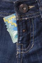 Condom in the blue jeans Royalty Free Stock Photo