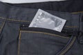 Condom in the blue jeans pocket Royalty Free Stock Photo