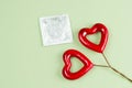 condom pack and hearts Royalty Free Stock Photo