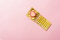 Condom on wrapper pack and contraceptive pills blister Royalty Free Stock Photo