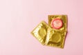 Condom in wrapper pack is tear open Royalty Free Stock Photo