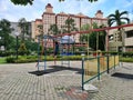 KUALA LUMPUR, MALAYSIA - August 3, 2020 : Condominium facilities with kids playing monkey bar during Covid 19 pandemic at playgrou