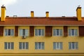 Condominium or modern apartment building with symmetrical architecture in the city downtown. Real estate development and urban gro Royalty Free Stock Photo