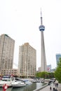 Condominiums and boat dock surrounding CN Tower at Habourfront Toronto Canada Royalty Free Stock Photo