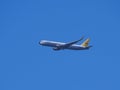 Condor aeroplane in flight in blue sky