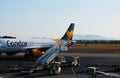 Condor air boeing 757 back hold door close up at berlin shonefeld airport.