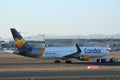 Condor Airline plane being towed, close-up view