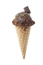 Cone of chocolate ice cream with toppings