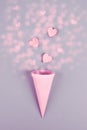 Cone with hearts, birthday and valentines day greeting card, spreading love, positive emotion, flat lay