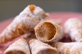 Cone-shaped cookie filled with dulce de leche. Brazilian dessert.