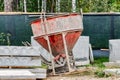 Cone tank for conveying and pouring concrete in monolithic construction by crane. A capacity for transporting concrete. Reinforced