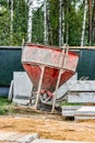 Cone tank for conveying and pouring concrete in monolithic construction by crane. A capacity for transporting concrete. Reinforced