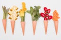 Cone waffle with pineapple slices, zucchini`s flower,basil,tomatoes and baby carrot