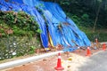 Cones barricade dangerous collapsed eroded hill slope area