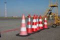 Cones and a ladder on flying field of an airport