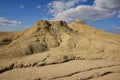 cones of mud volcanoes from which rivers of mud flow