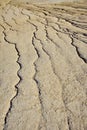 cones of mud volcanoes from which rivers of mud flow