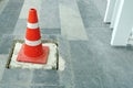 A cones on the pathwalk floor to protect was fixxing a broken drain Royalty Free Stock Photo