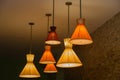 cones shaped vintage retro style electrical ceiling lights at night Royalty Free Stock Photo