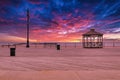 Coney Island beach with Pavilion and Boardwalk during sunset Royalty Free Stock Photo