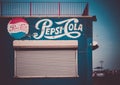The big sign of Pepsi-Cola brand. Illustration  painted on the wall. Vintage look photo. Royalty Free Stock Photo