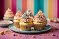 tasty cupcakes with cream and colorful sprinkles - christmas theme