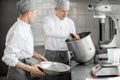 Confectioners working at the bakery manufacturing