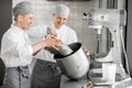 Confectioners working at the bakery manufacturing