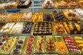 confectionery bakery variety of traditional colorful cakes in a counter in Porto Portugal