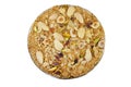 Confectionery sweet circular Eastern candy made of sugar, sesame, nuts, hazelnuts, almonds and pistachios, a special dessert disc