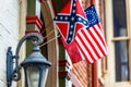 Confederate battle flag and 34 stars American Civil War Flag attached to the building, historic downtown of Gettysburg, Royalty Free Stock Photo