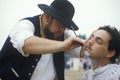 Confederate participants shaving in camp scene during recreation of Battle of Manassas, marking the beginning of the Civil War Royalty Free Stock Photo