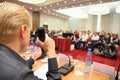 Conference in hall. man with microphone. Royalty Free Stock Photo