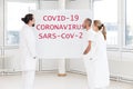 Conference or meeting with brainstorming of a group of hospital staff or scientists, concept corona virus or covid-19, sars-cov-2