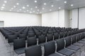 Conference and Meeting Room with Rows of Black Chairs Royalty Free Stock Photo