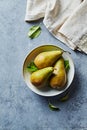 Conference Pears in a ceramic bowl. Top view