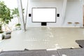 Conference room interior with a white wall and large white scree