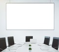 Conference room with table and chairs and blank white board on t Royalty Free Stock Photo