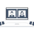 Conference room with video call screen and table Royalty Free Stock Photo