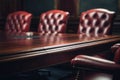 A conference table with red leather chairs. Suitable for office or meeting room concepts Royalty Free Stock Photo