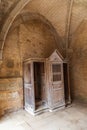 Confessional in the ruined stone church in the martyr village of Oradour-sur-Glane Royalty Free Stock Photo