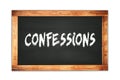 CONFESSIONS text written on wooden frame school blackboard