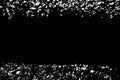 Confetti - black and white confetti scattered on a black background