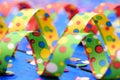 Confetti and colorful paper streamer at carnival Royalty Free Stock Photo