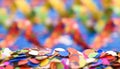 Confetti and colorful paper streamer at carnival Royalty Free Stock Photo