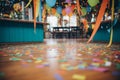 confetti covering the floor of a party venue Royalty Free Stock Photo