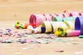 Confetti, streamers and party blower on wood background Royalty Free Stock Photo