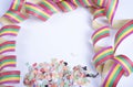 Confetty and colorful streamers on white background Royalty Free Stock Photo