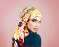 Confidence brings out the beauty. Studio portrait of a confident young woman wearing a colorful head scarf while posing Royalty Free Stock Photo