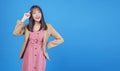 Confidence business positive young woman thinking have good idea holding finger over own head while looking at copy space standing Royalty Free Stock Photo